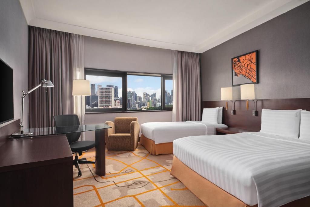 10 Nights Holiday Deal for Adaaran Club Rannalhi & Holiday Inn Singapore Atrium with Classic Ocean View Room, Starting from £ 2,099 PP